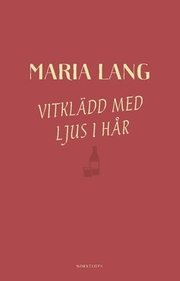 Vitklädd med ljus i hår